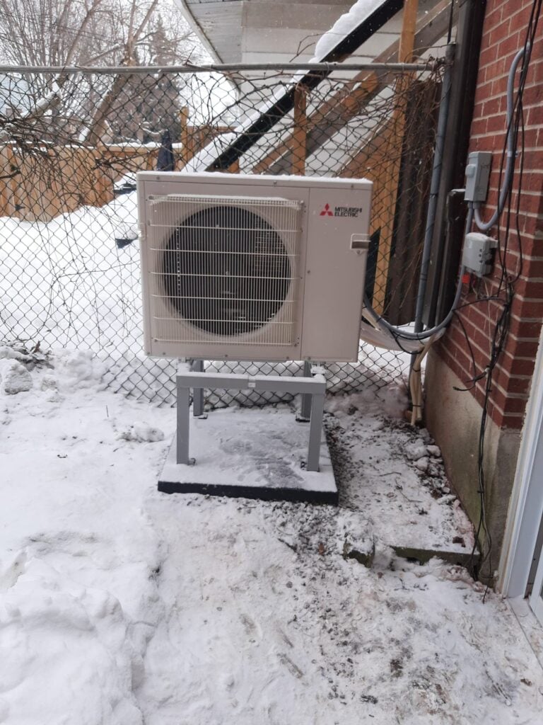 Ductless split system Mitsubishi Heat Pump Outdoor Unit Installed by AirZone HVAC Services.