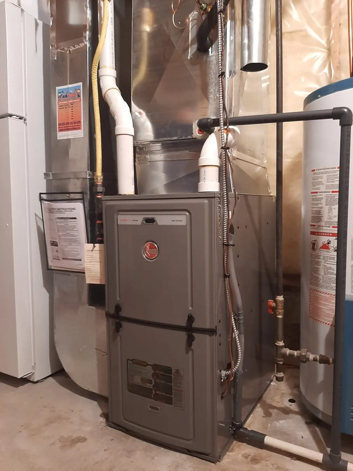 Rheem gas furnace and connected ductwork installed by AirZone in Kanata