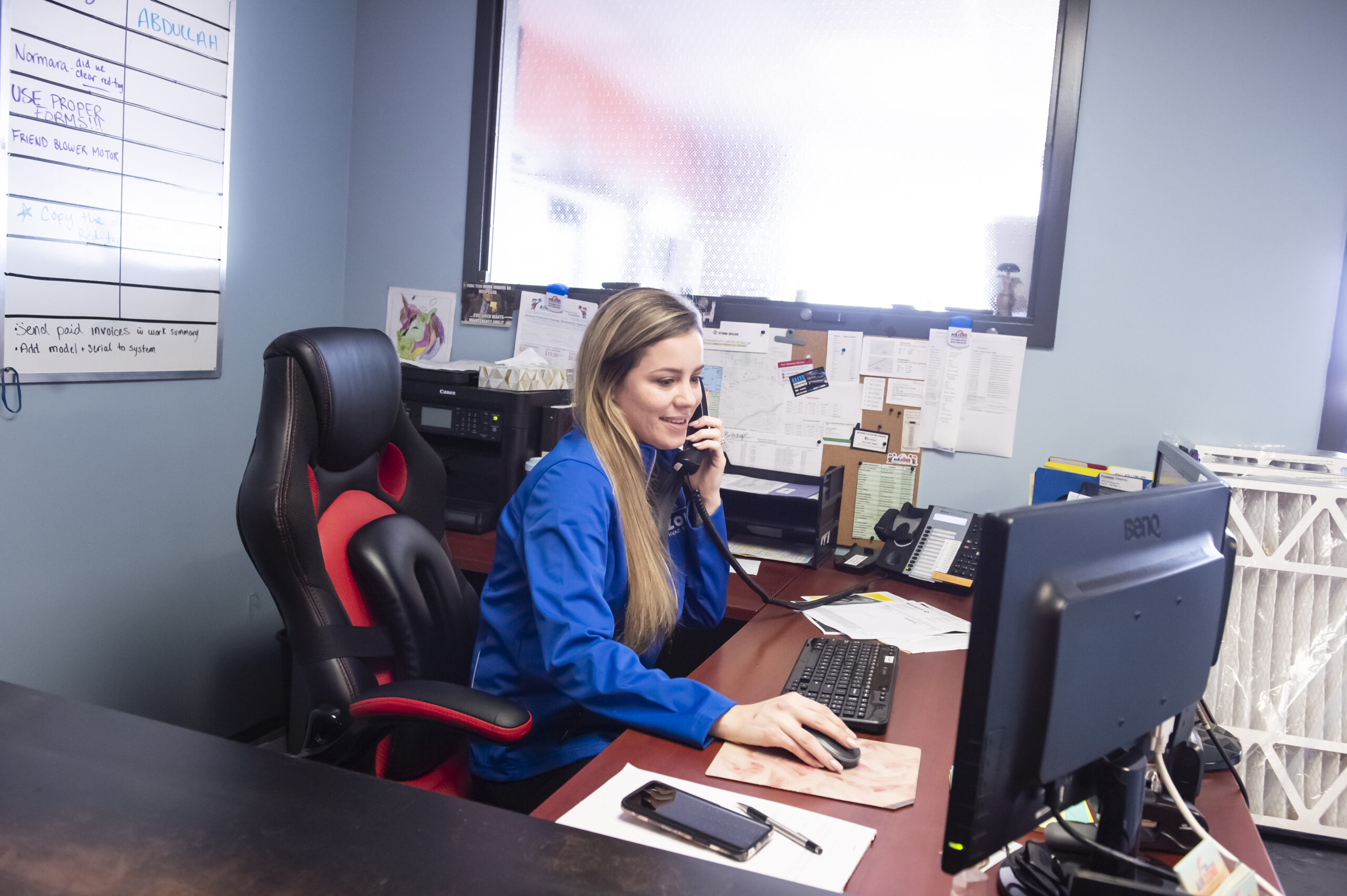 AirZone office team member answering a customer call