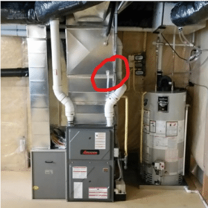 cloggedDrainAirConditionerFurnace-300×300-1 - AirZone HVAC Services - AirZone HVAC Services Clogged Drain Location on A Furnace in Ottawa.