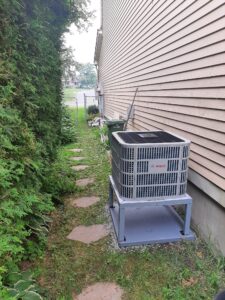 A Bosch IDS Premium 2.0 installed in the side yard of a residential home in Kanata, Ontario. AirZone HVAC Services completed the installation in 2023.