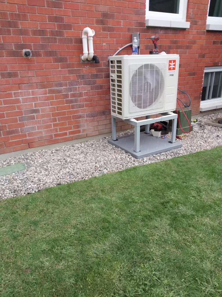 Mid installation picture of a Moovair cold climate heat pump in Greely. AirZone HVAC Services has helped people save money on propane, oil, gas and electricity for two decades!