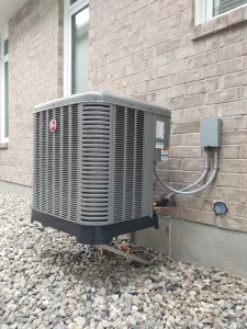 New air conditioner installation in the Findlay Creek area of Ottawa. Reliable cooling year round from Rheem.