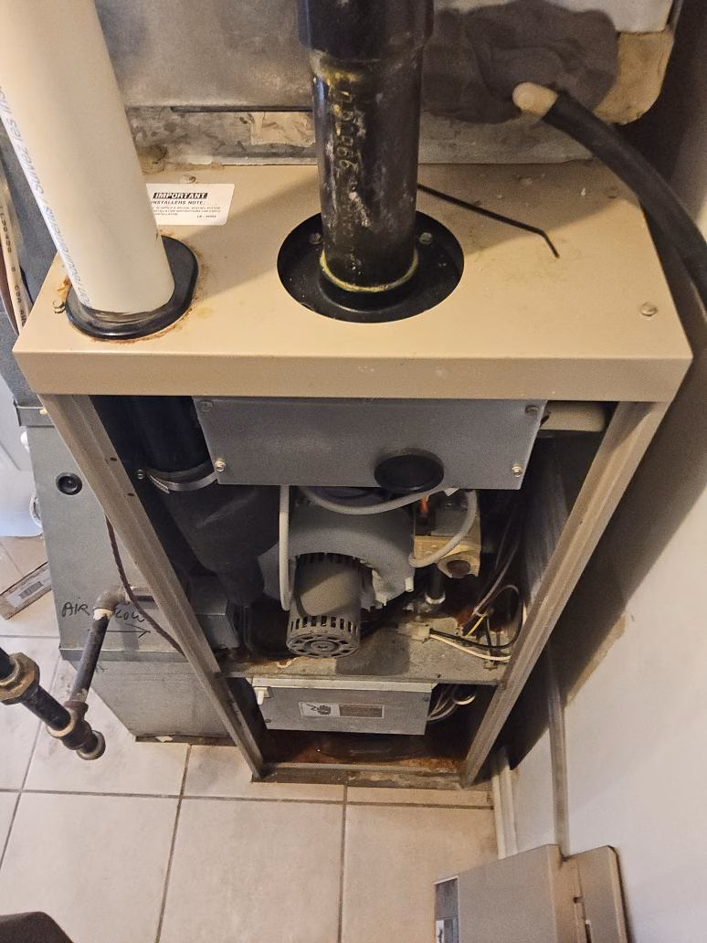 Original Goodman furnace before replacement at a Hunt Club home